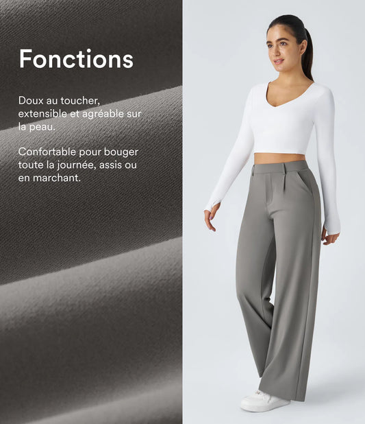 Pantalon tailleur fluide à taille haute, coupe droite avec poches.